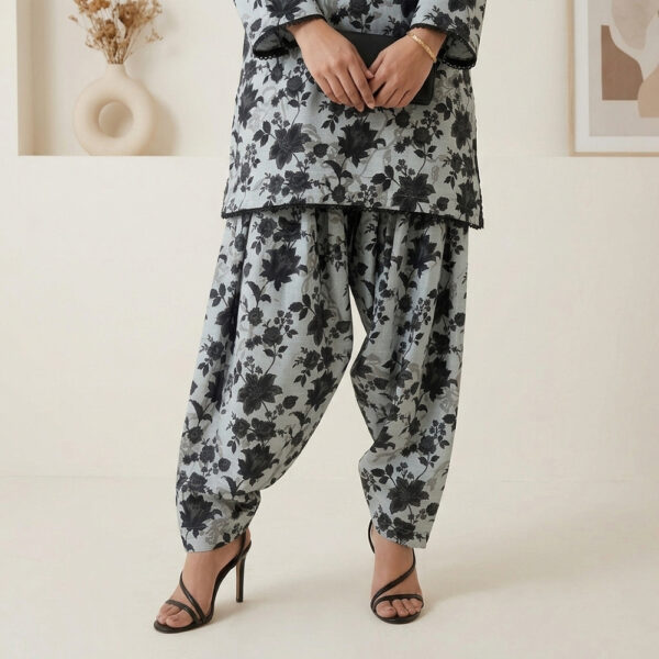Ice Blue Khaddar 2pc women pakistani suits wholesale new york (4) Premium 2-piece khaddar suit Soft, warm, and durable textured khaddar fabric Elegant ice blue color with charcoal floral print Matching all-over printed shirt and Farshi shalwar Traditional voluminous Farshi shalwar Stylish square neckline Premium black loop lace on neckline, sleeves, and hem Comfortable for winter and everyday wear Perfect for casual outings and family gatherings Ideal for boutiques, retailers, and wholesale buyers